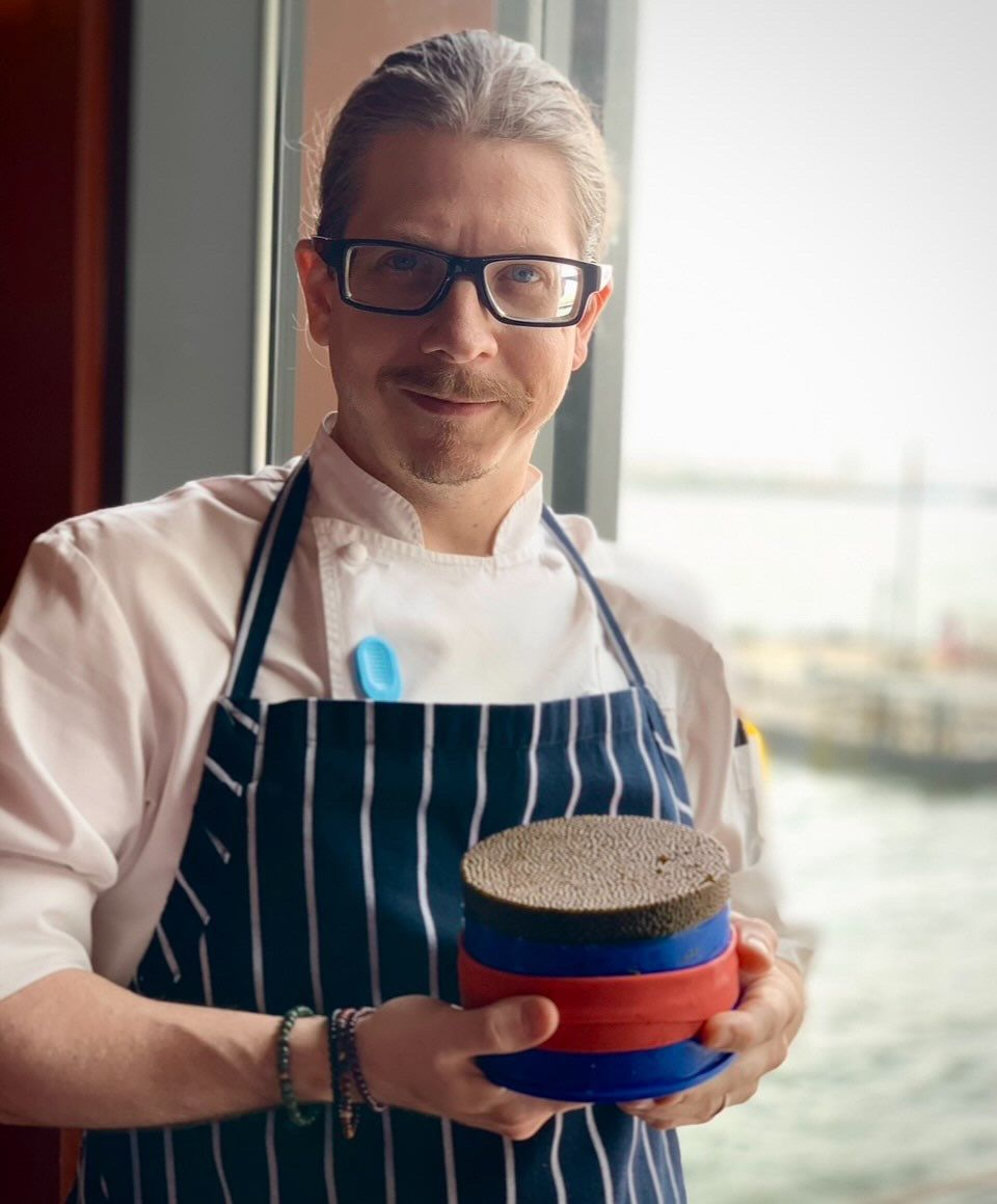 Chef Brendan Scott, wearing an apron