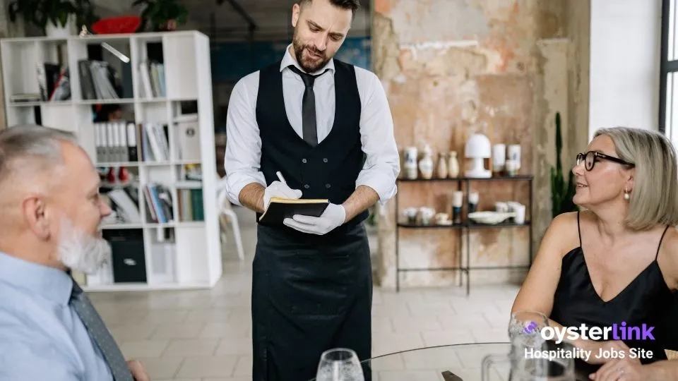 fine dining server writing down the order