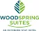 WoodSpring Suites - Concord Charlotte Speedway logo