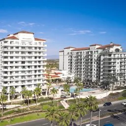 The Waterfront Beach Resort logo