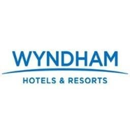 Wyndham Garden Baronne Plaza Hotel logo
