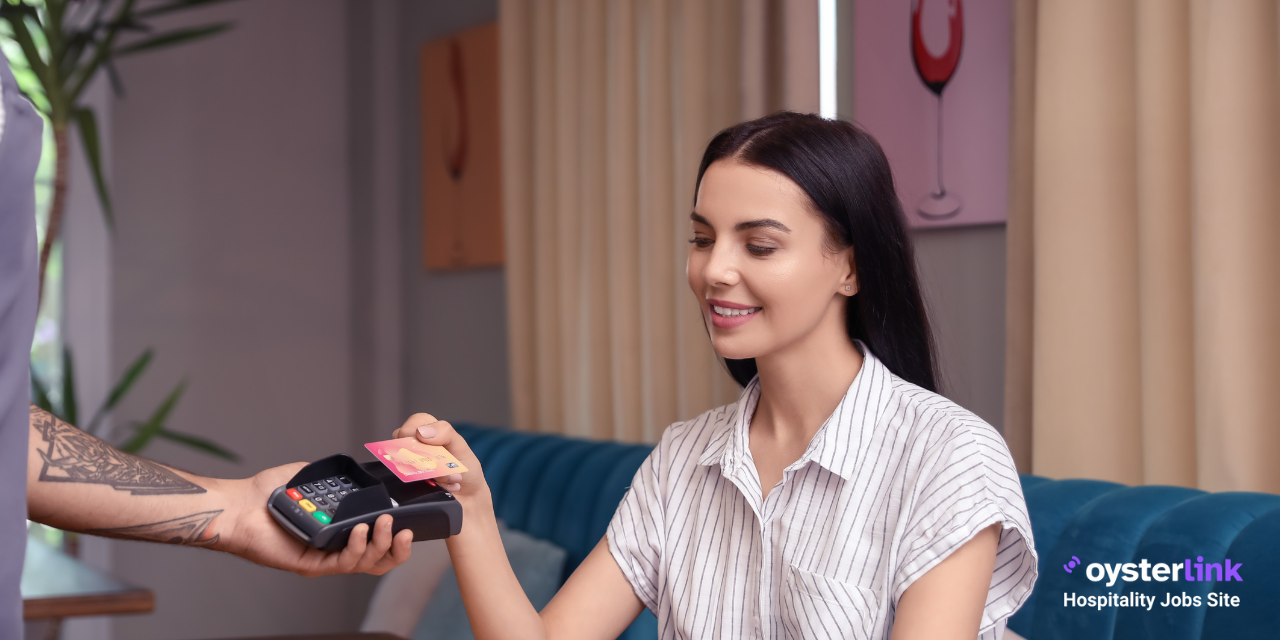 woman paying by card