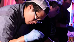 Chef Diego Ng cooking with others