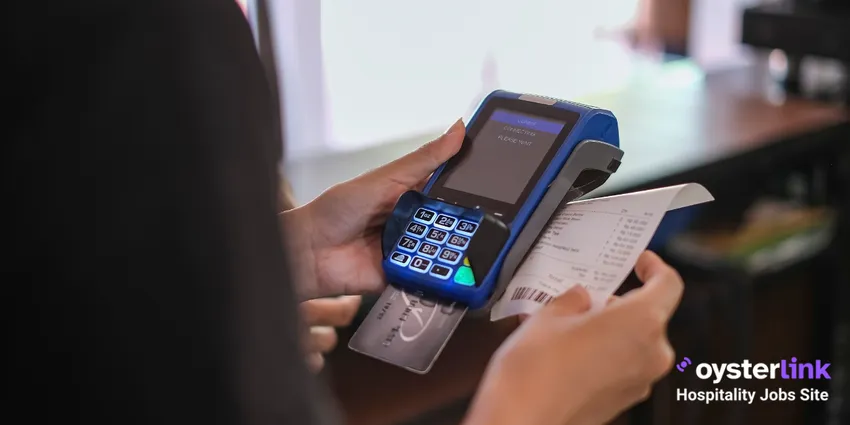 server taking a card payment