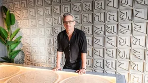 Michael Tronn wearing a black shirt and staring at the camera