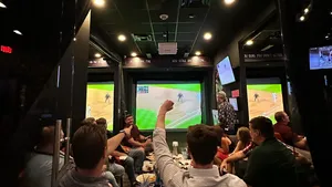 Crowds cheering at the PLAY sporting lounge