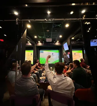 Crowds cheering at the PLAY sporting lounge