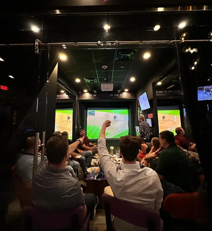 Crowds cheering at the PLAY sporting lounge