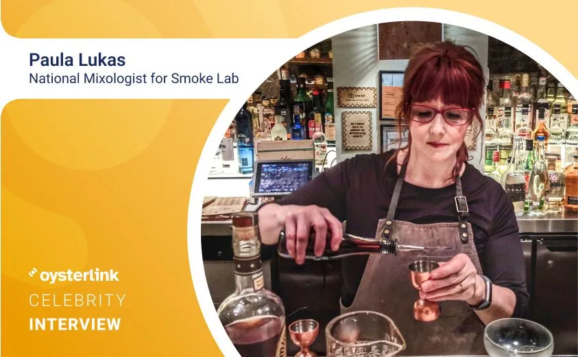 Paula Lukas, bartender behind the bar