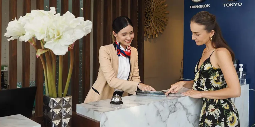 receptionist welcoming guest