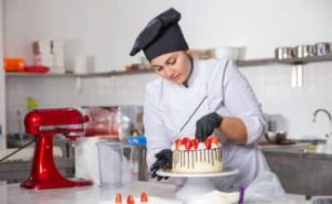 pastry chef working in professional kitchen