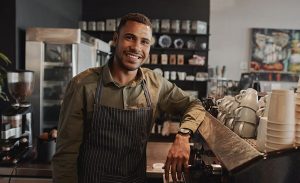 Barista smiling to the camera