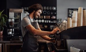 Barista making coffee