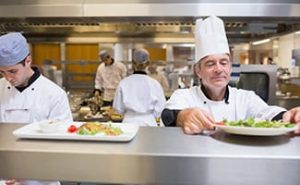 a head chef in a restaurant kitchen, head chef jobs