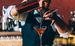 Bartender pouring drinks