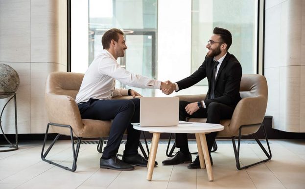 Image of a hiring manager talking to a job candidate