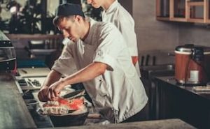 sushi chef making sushi