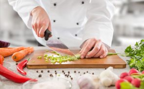 prep cook salary hero image - chopping vegetables
