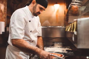 A man making a pizza