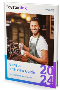 A barista about to pour coffee into a cup