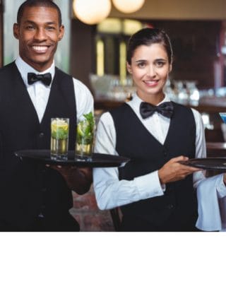 A waiter and a waitress in a restaurant