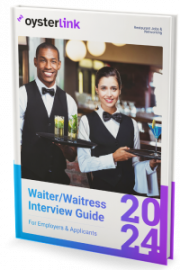 A waiter and a waitress in a restaurant