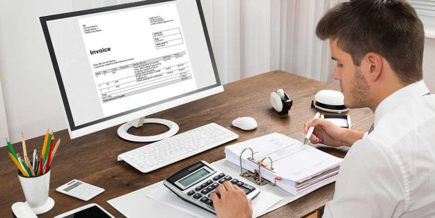 an accountant sorting invoices