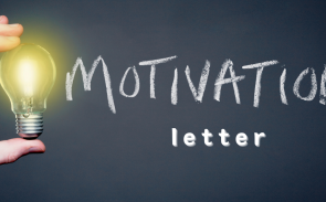 A light bulb and the words motivation letter on the blackboard