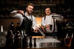 bartenders making cocktails