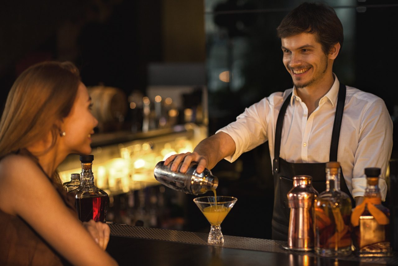 bartender serving drink