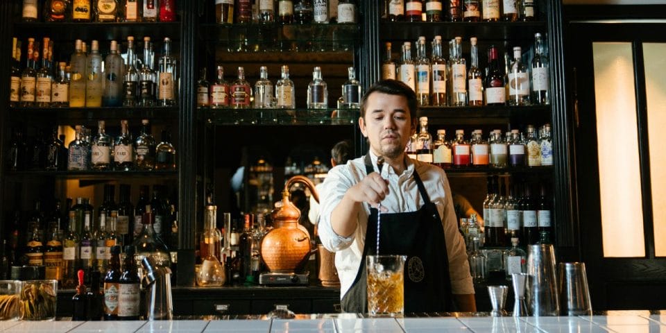 bartender mixing a drink