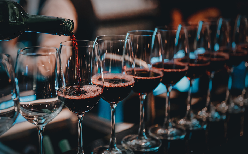 bartender pouring wine