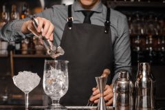 bartender placing ice