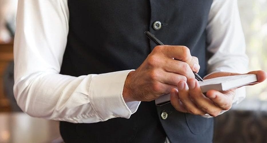 waiter with notepad