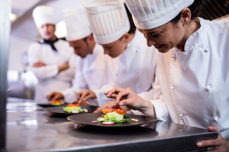 Kitchen staff preparing food