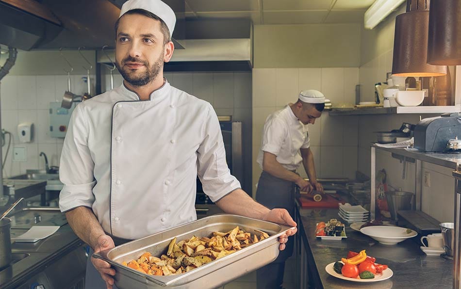 kitchen worker carrying food; why do chefs say all day