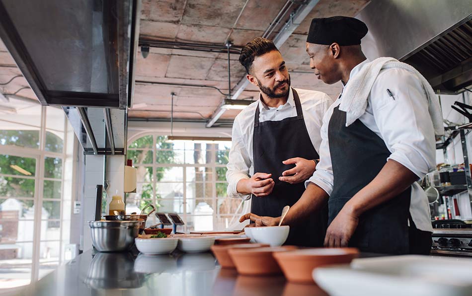 two chefs talking