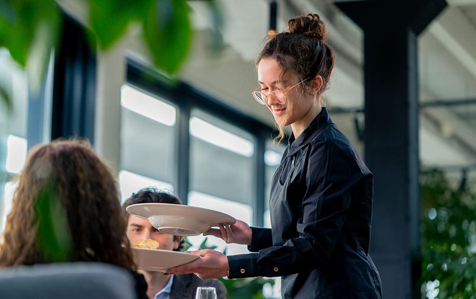 waitress bringing food