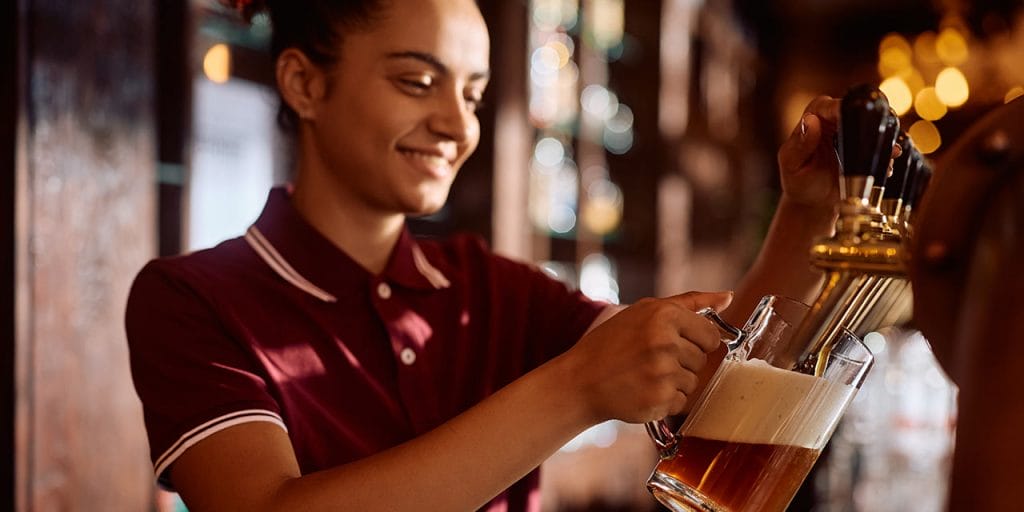 bartender pouring beer