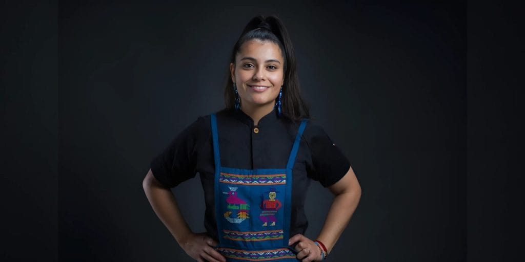 Portrait of Chef Carmen Miranda with a dark background