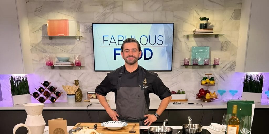 Executive Chef Wissam Baki in front of a cooking set