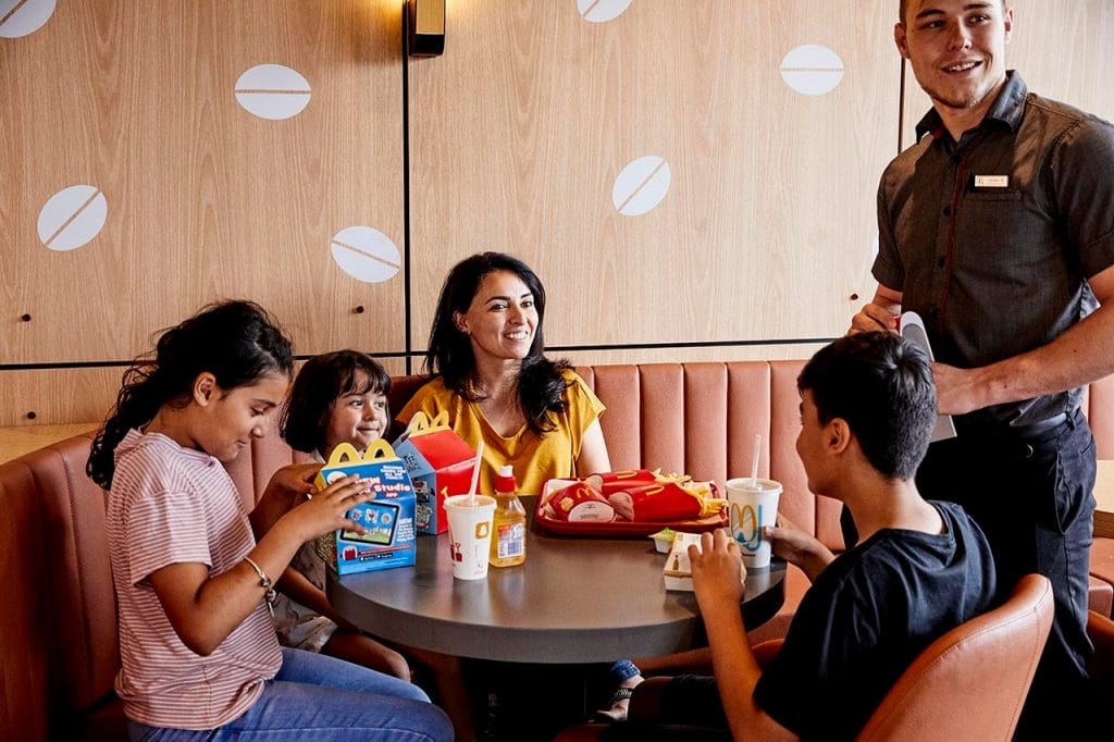 family visiting a McDonald's store