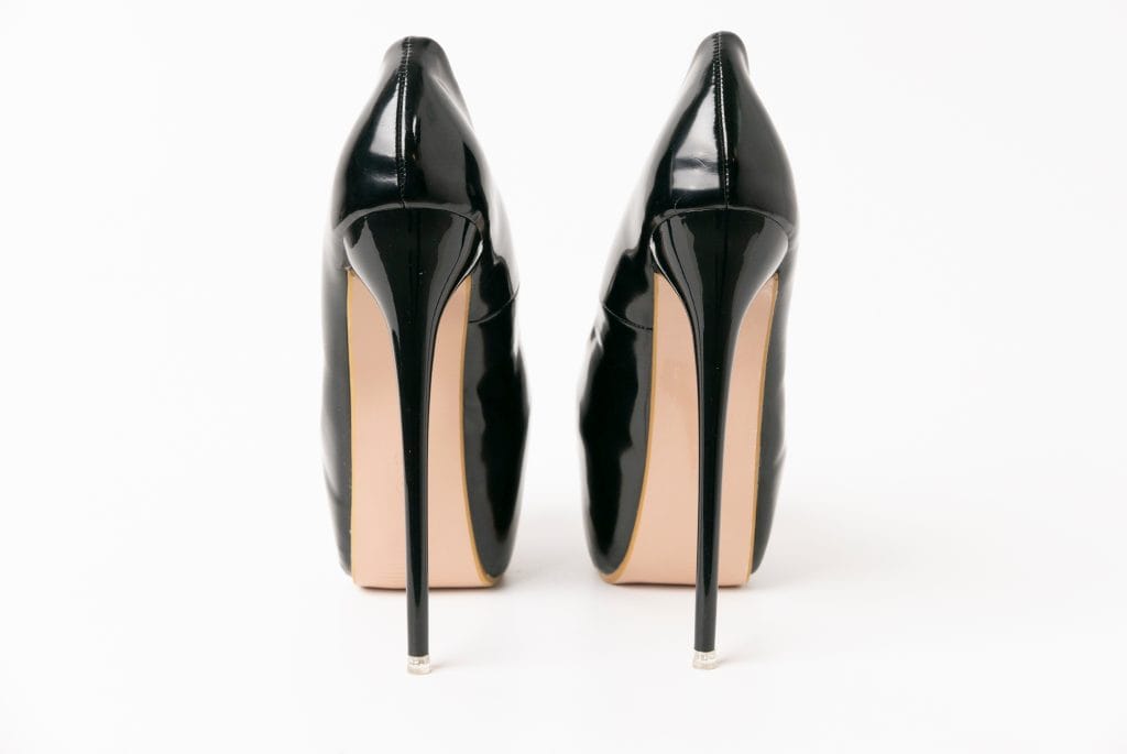 extra high black stiletto heels; What Not To Wear to an Interview