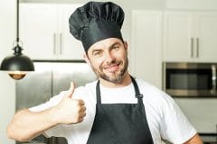 happy baker showing thumbs up