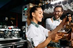 bartender pouring beer