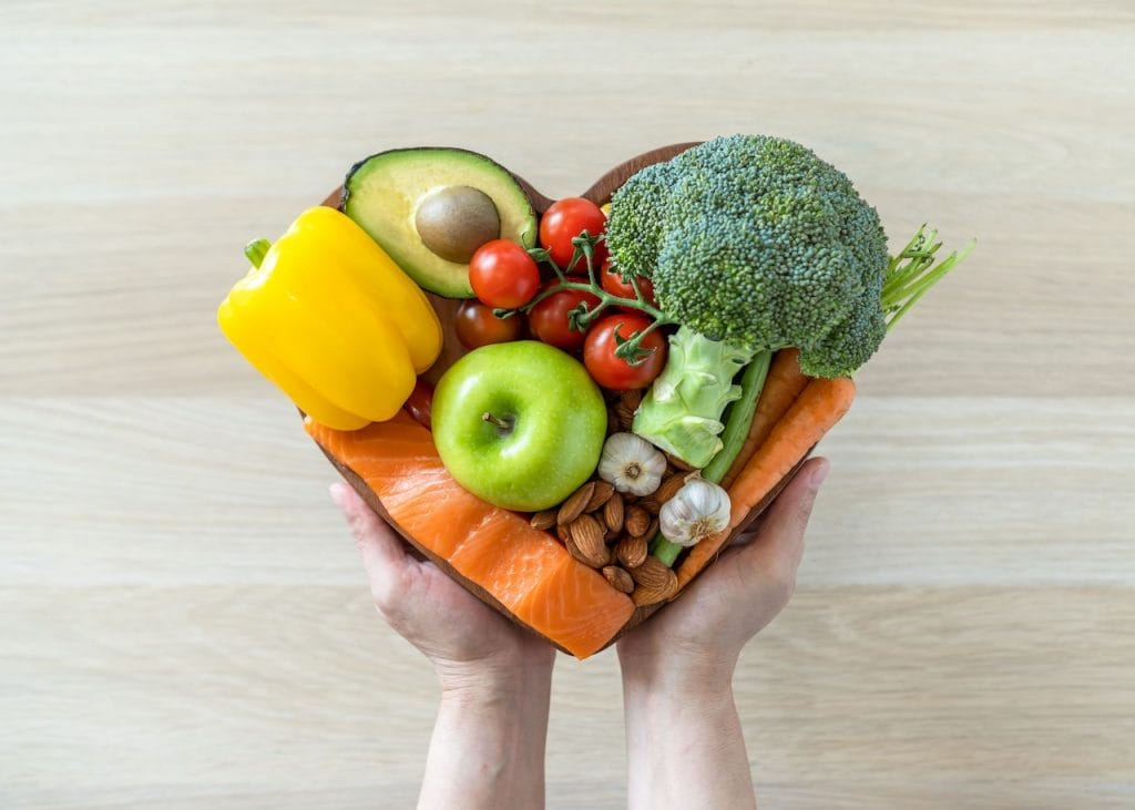 Food items arranged in the shape of a heart