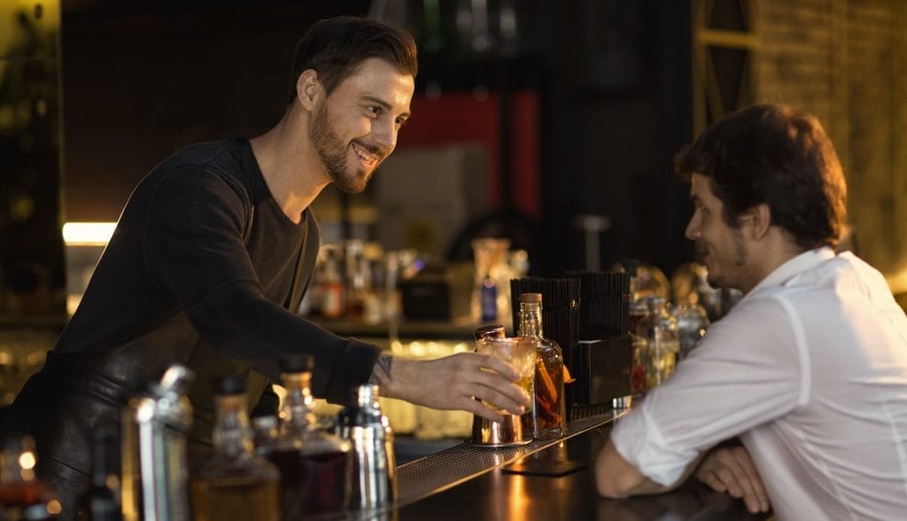 bartender talking to customer