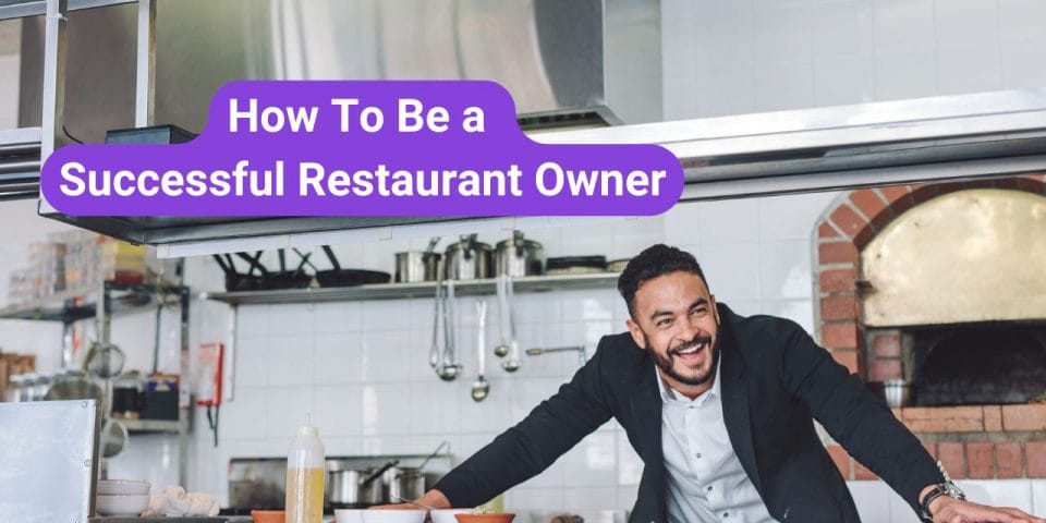 restaurant owner smiling in the restaurant kitchen