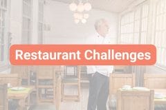 restaurant owner standing in his restaurant