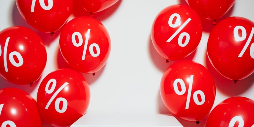 red balloons with percentage signs